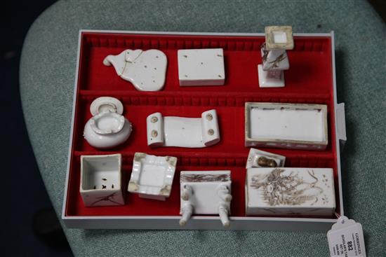 A Chinese nine piece porcelain scholars table set, c.1885-1910, 5.2-9cm, some faults